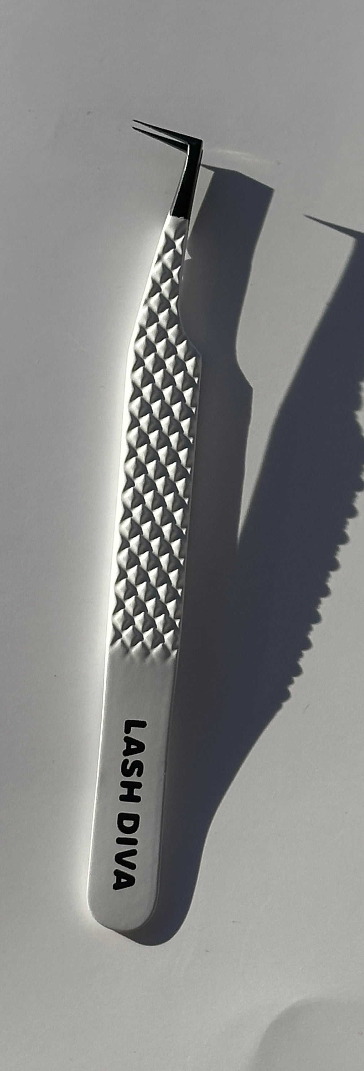 Volume booth tweezers